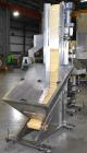 Used E-Pak Automatic Inline Quill Capper with Integrated Cap Elevator/Sorter.